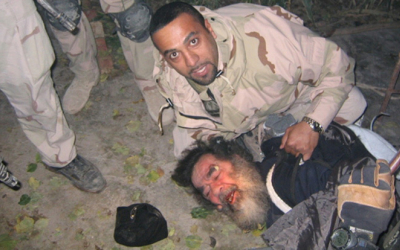 13 декември 2003, уапсен е Садам Хусеин